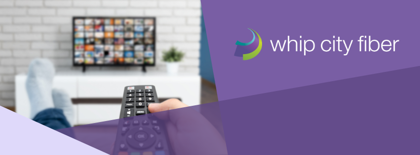 A remote pointed at a television screen